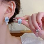 Elegant Floral & Pearl Earring Set - Image 5