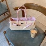 Elegant Woven Straw Tote Bag with Pink Leather - Image 2